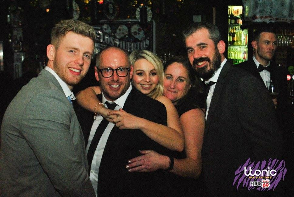 New World Designs team and friends celebrating award win